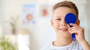 kid with blue pad on left eye What Is Myopia In Children How To Control It ss feat