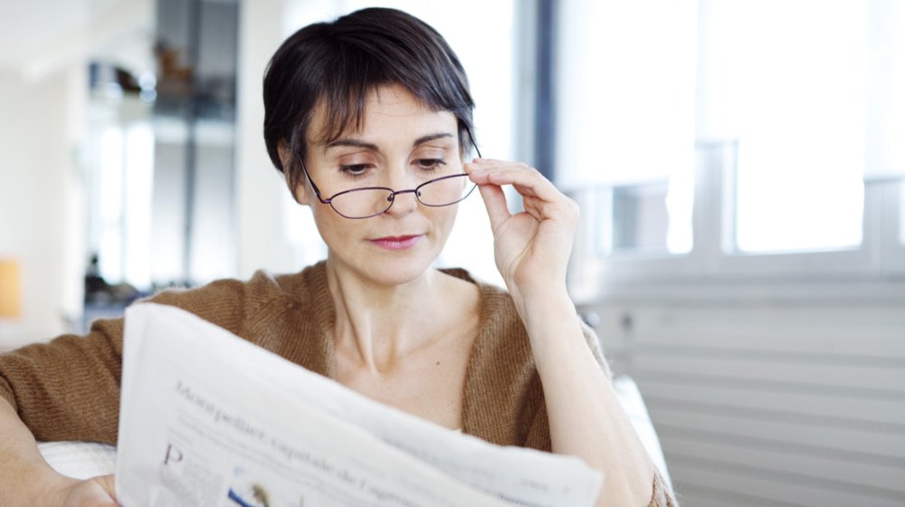 woman reading What Is Presbyopia