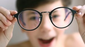 teenager-kid-boy-in-myopia-correction-glasses-close-up-portrait---How-Can-Poor-Vision-Affect-Children-In-Learning---ss-feat